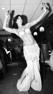 Belly dancer in a restaurant.